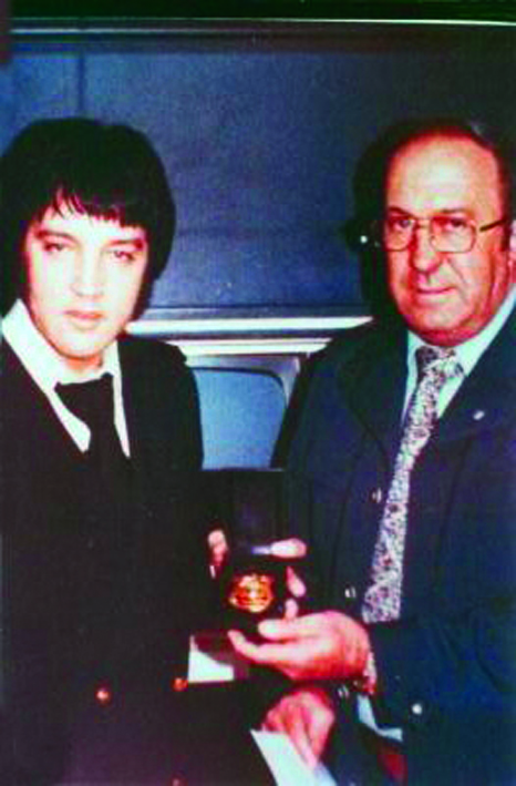 760206 Receiving his staff reserve captains badge from Chief Crumby.jpg